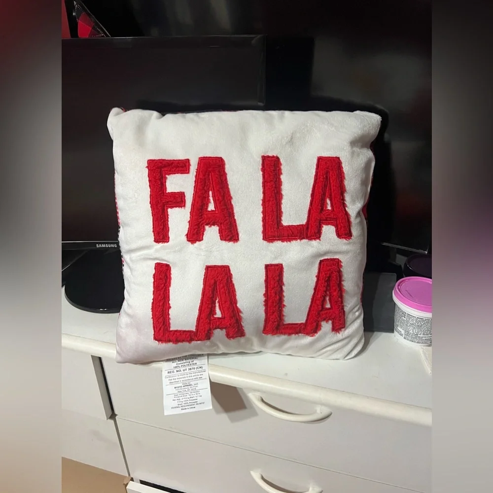 Fa La La La Pillow with Buffalo Plaid Print Back